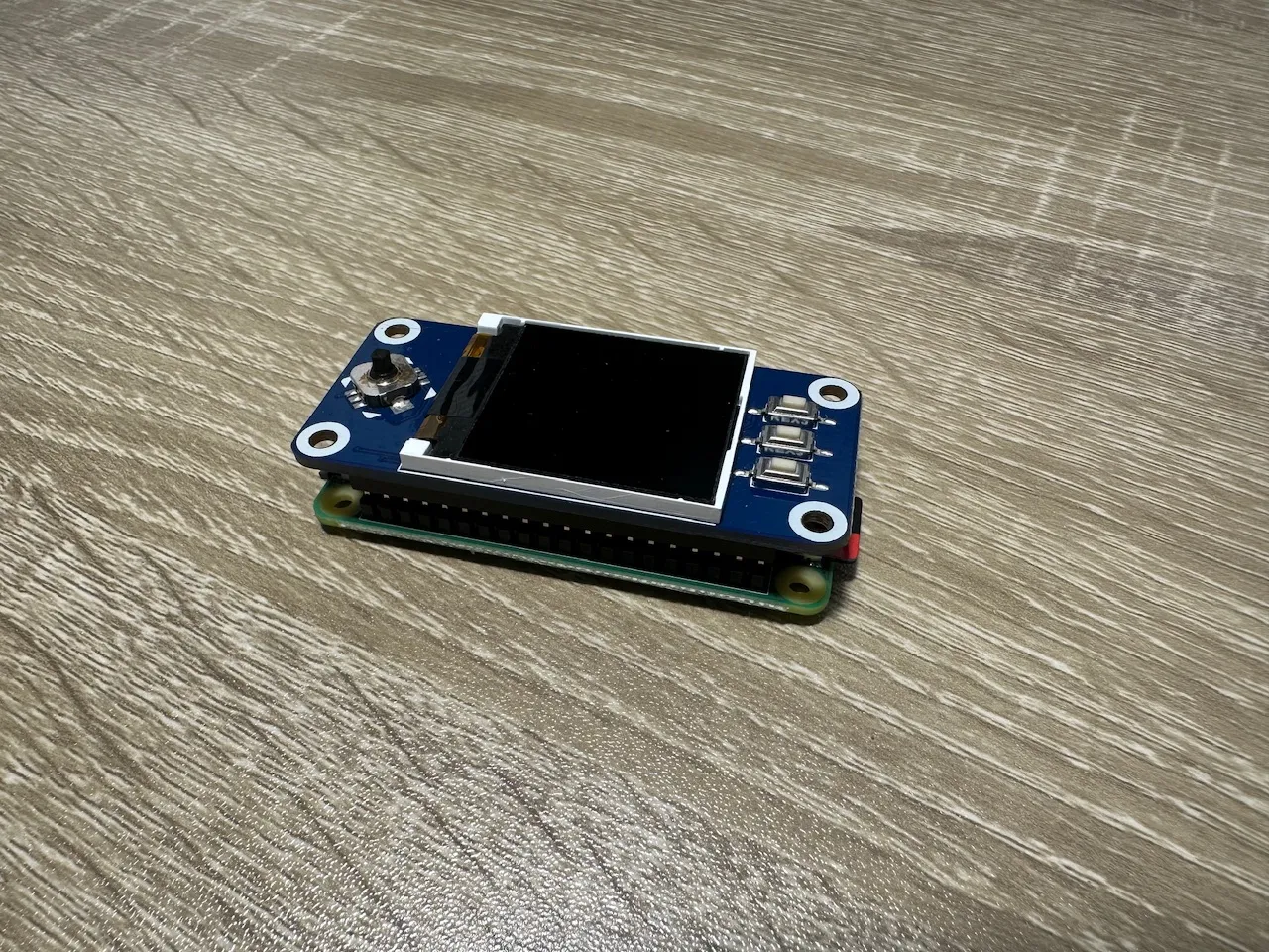 Raspberry Pi Zero with a display hat on top of it